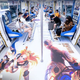 Commuters ride a League of Legends themed subway car as China marks an anniversary.
